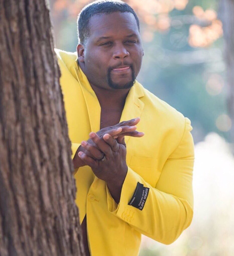 Black guy hiding behind tree Meme Preview Image