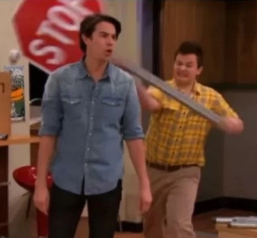 Gibby hitting Spencer with a stop sign Meme Preview Image